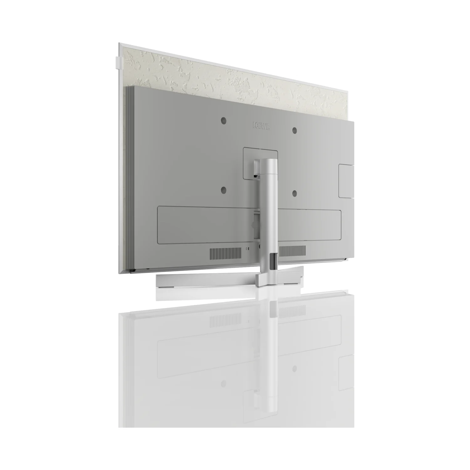 Loewe stellar 42 dr+ (Tizen), Rückansicht mit Tischfuss, Rückwand aus Echtbeton